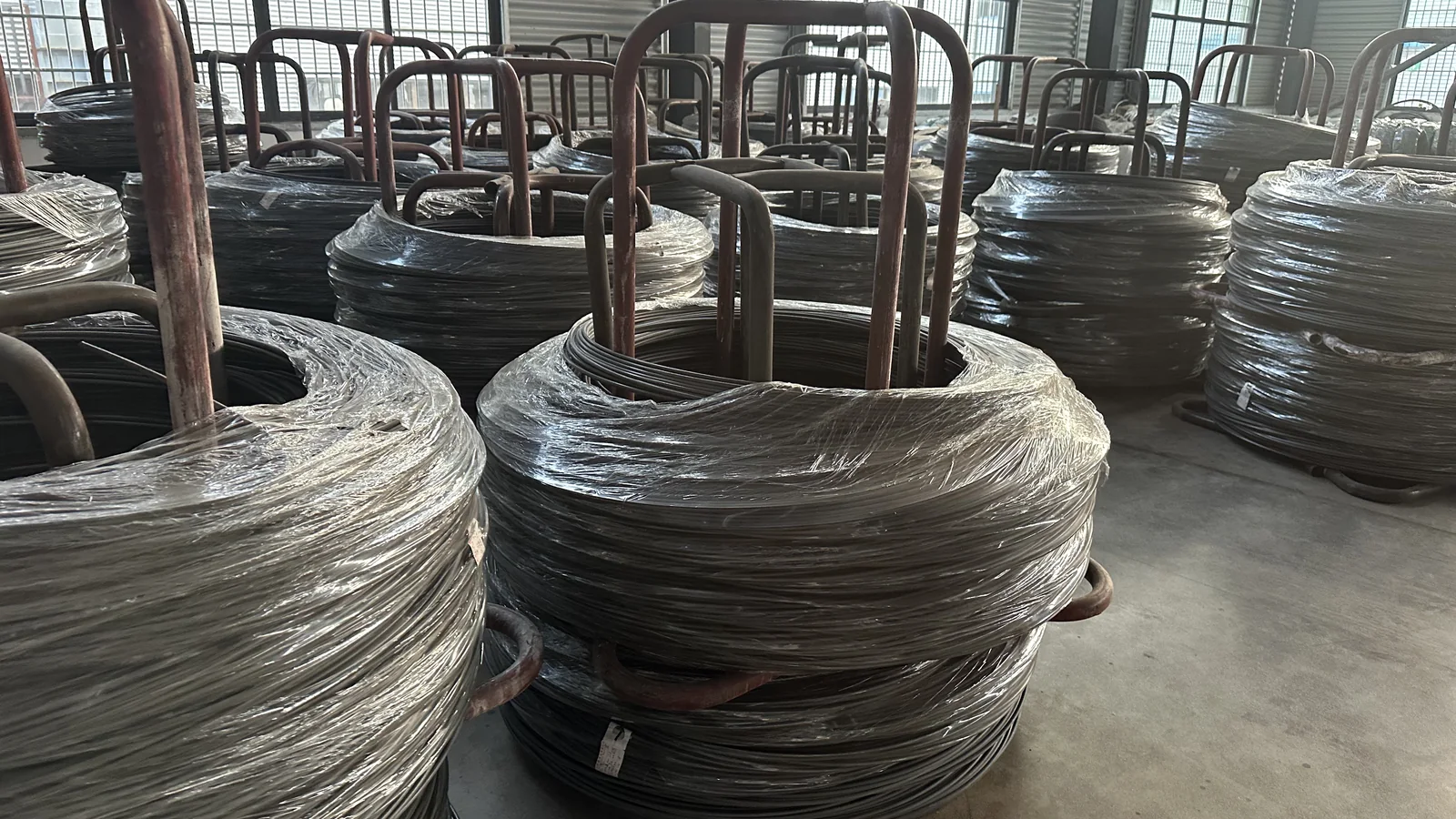 Carbon steel wire coils stored for fastener forming operations