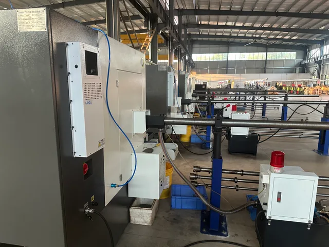 CNC lathe cell and bar-feeding area at PremFixer