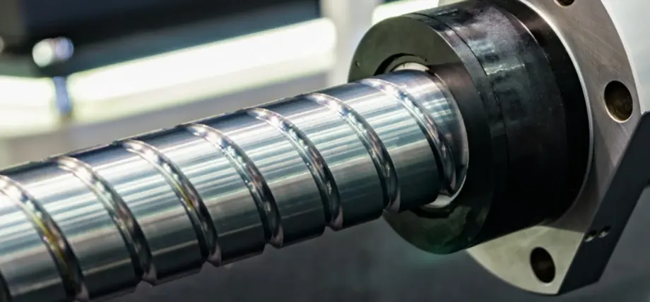 Close up of a precision ground metallic ball screw