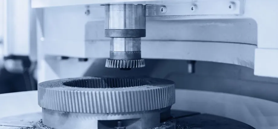 Gear shaping machine in operation